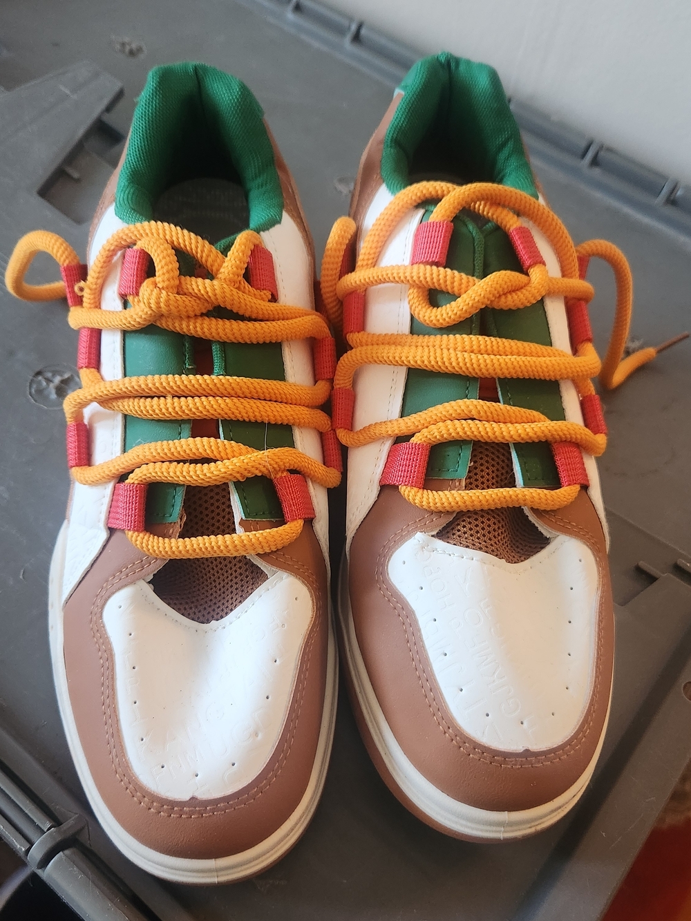 Men's Multicolor Casual Sneakers with Green Upper and Brown Accents.
